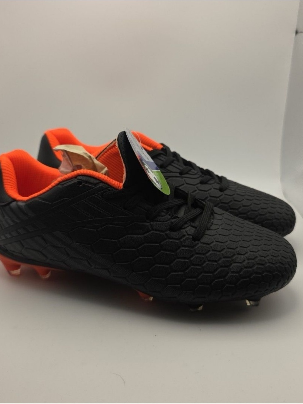Men's Black and Orange Soccer Cleats